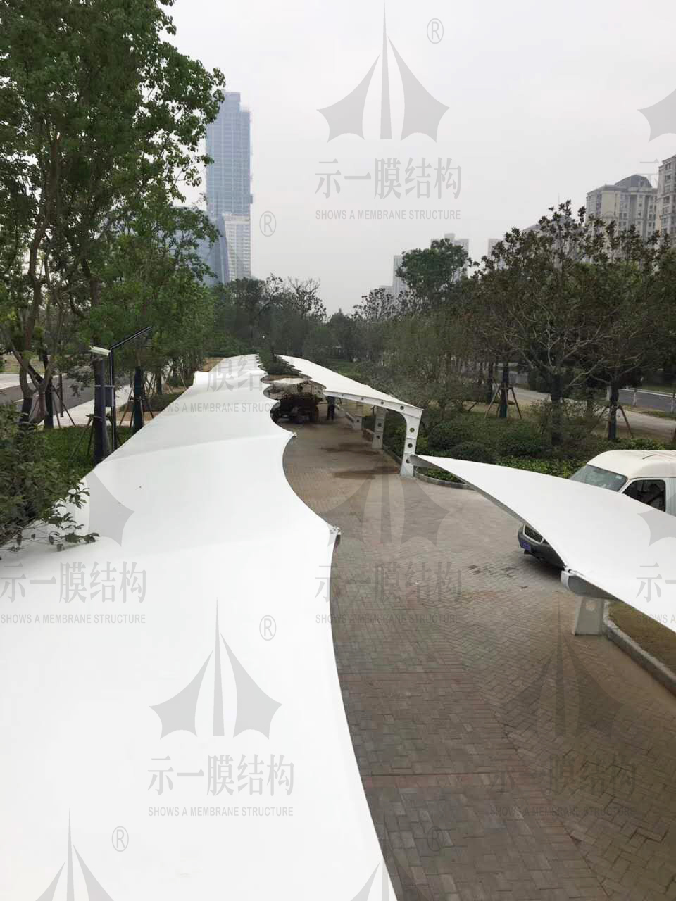 上海示一膜結(jié)構(gòu)有限公司南通能達(dá)大廈電動車停車棚